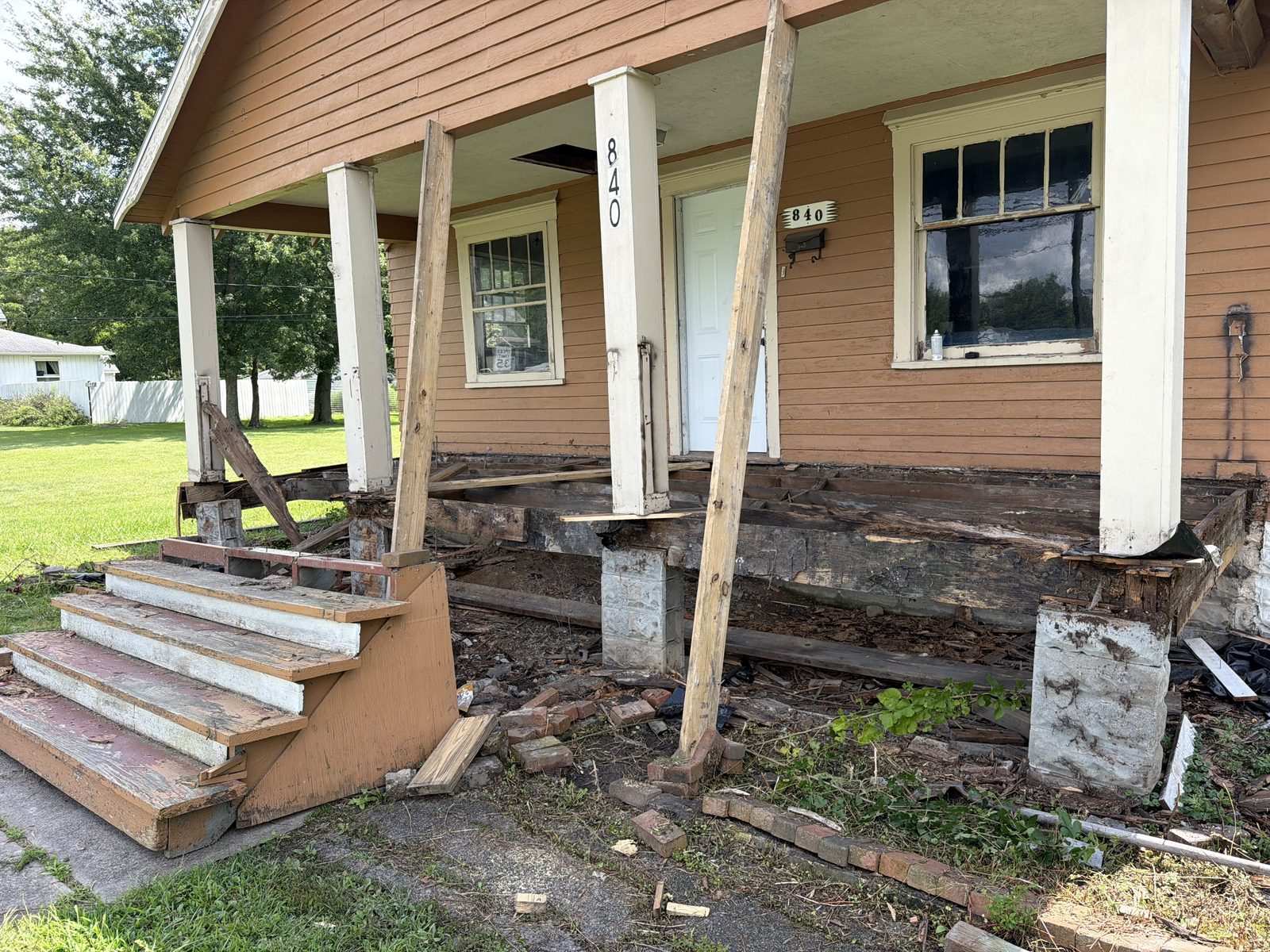 Porch torn down to framing for rebuild