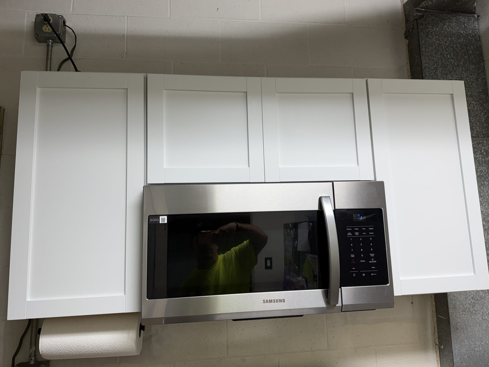 New cabinets and microwave installed